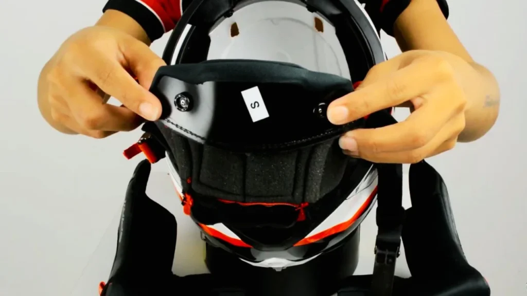 Remove the padding (most helmets have removable liners).