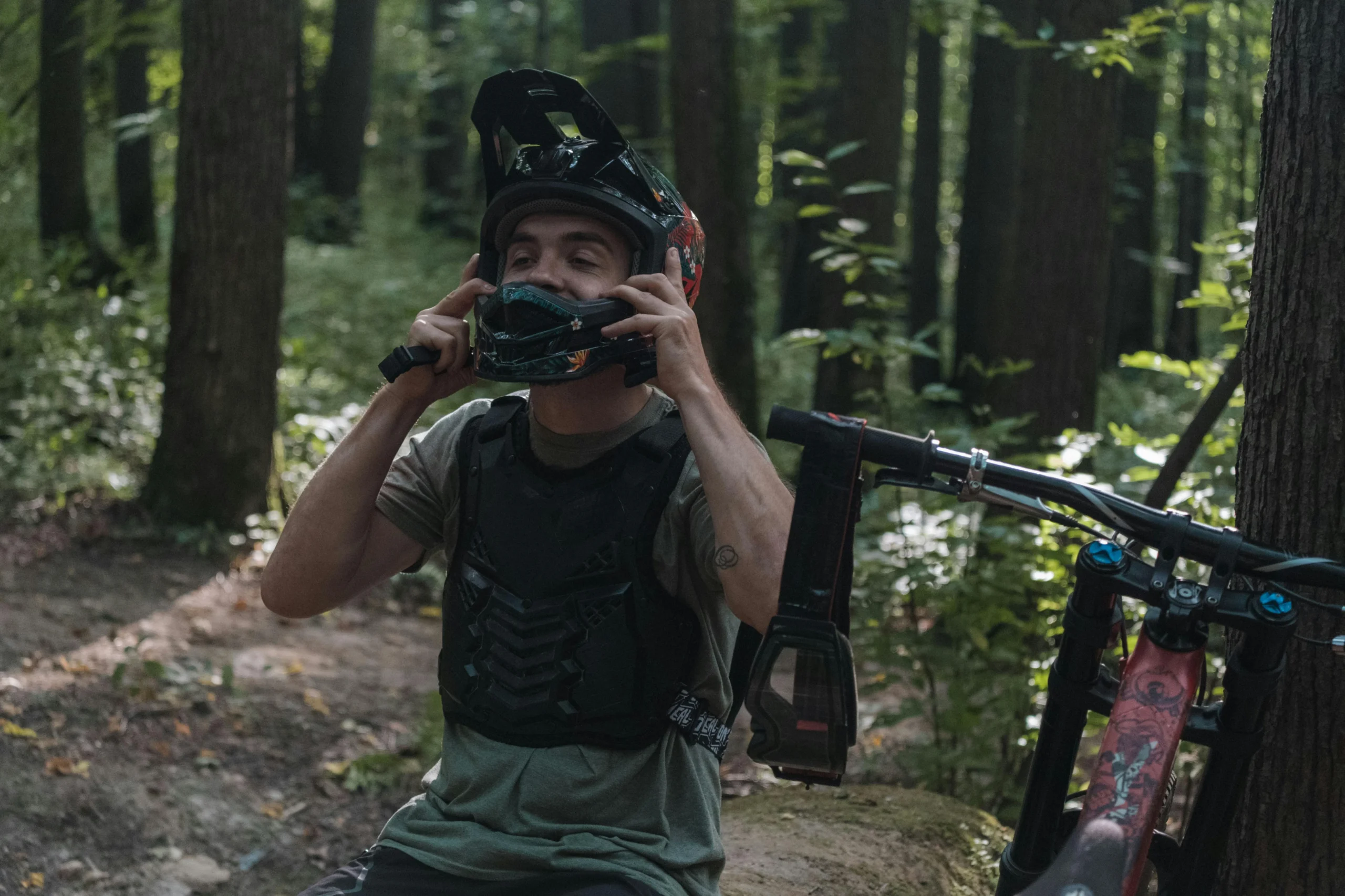 how to put on a motorcycle helmet​